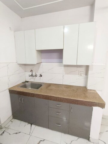 Kitchen in 1 BHK Builder Floor at Khirki Extension – for Rent