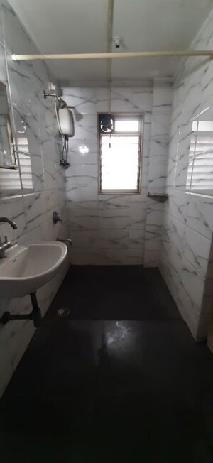 Bathroom in 3 BHK Apartment at Manchester Heights, Khar West – for Rent