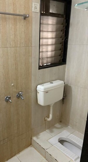 Bathroom in 2 BHK Apartment at Hubtown Greenwoods, Vartak Nagar – for Sale