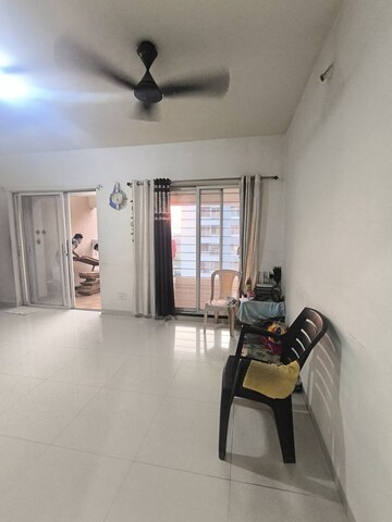 Living Room in 2 BHK Apartment at Rama Queensland, Moshi – for Rent