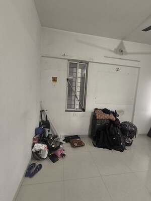 Living Room in 2 BHK Apartment at Rama Queensland, Moshi – for Rent