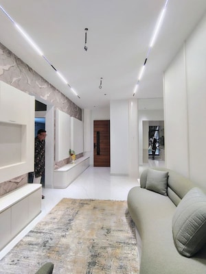 Living Room in 1 BHK Apartment at Thanekar BKC Paramount, Katrap – for Sale