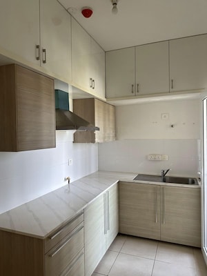 Kitchen in 2 BHK Apartment at Bhartiya Nikoo Homes Phase 2, Thanisandra Main Road – for Sale