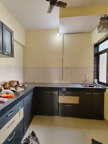 Kitchen in 1.5 BHK Apartment at Lodha Codename The Ultimate, Majiwada – for Rent