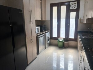 Kitchen in 3 BHK Builder Floor at Defence Colony – for Rent