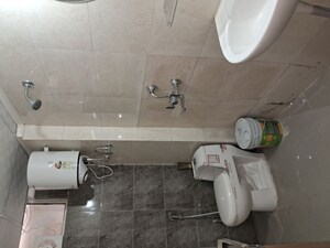 Bathroom in 3 BHK Apartment at Mittal Rajnagar Residency, Raj Nagar Extension – for Rent