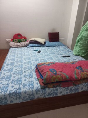 Bedroom in 2 BHK Apartment at Ravinanda Skylights, Wagholi – for Rent