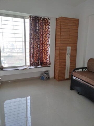 Living Room in 2 BHK Apartment at Galaxy Vineet, Bavdhan – for Rent