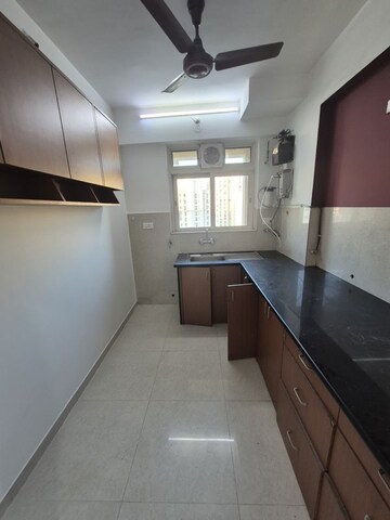 Kitchen in 2 BHK Apartment at Hiranandani Villa Grand, Ghodbunder Road – for Rent