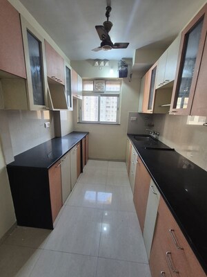 Kitchen in 2 BHK Apartment at Hiranandani Estate Villa Royale, Ghodbunder Road – for Rent
