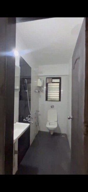 Bathroom in 2 BHK Apartment at Shree Om Amar Shakti, Eksar – for Rent