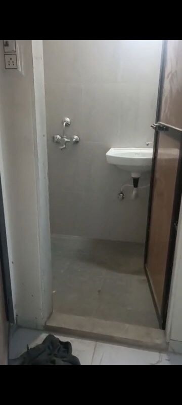 Bathroom in 1 BHK Apartment at The Baya Park, Dadar West – for Rent