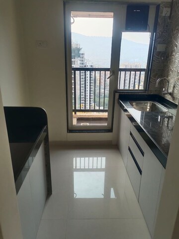 Kitchen in 1 BHK Apartment at Raunak Residency Thane, Pokhran Road No One – for Sale