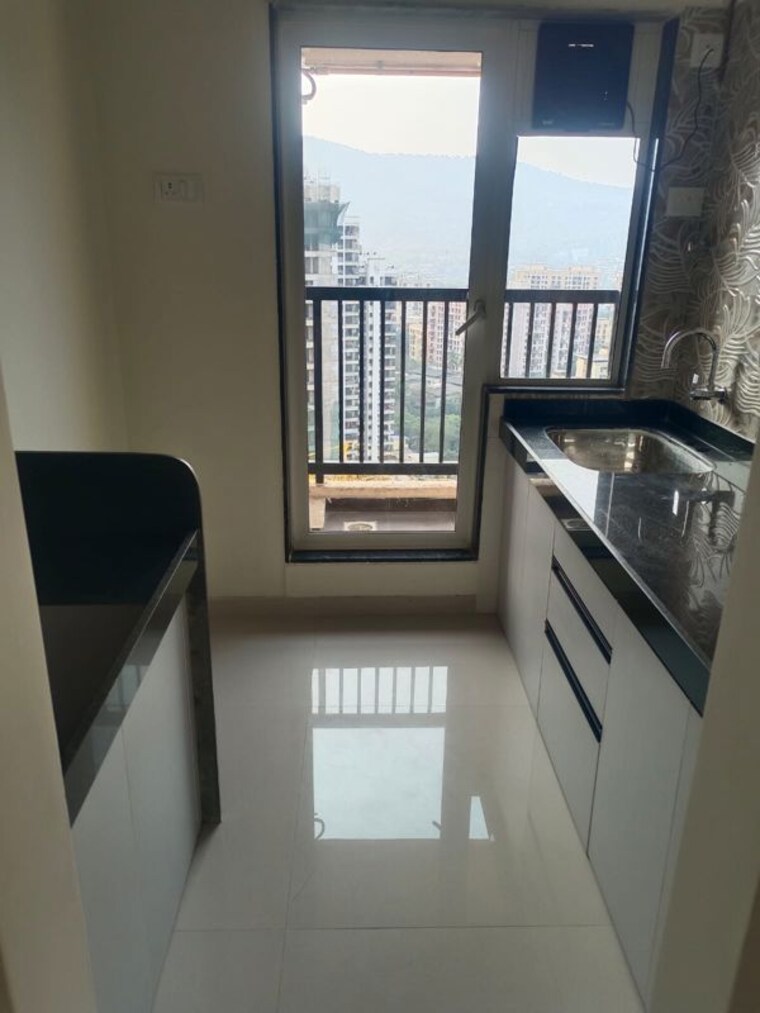 Kitchen, raunak-residency-thane 1 Bedroom 457 Sq.Ft. Apartment In Pokhran Road No One Thane 10072339