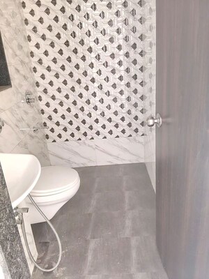 Bathroom in 1 BHK Apartment at UK Iridium, Kandivali East – for Rent