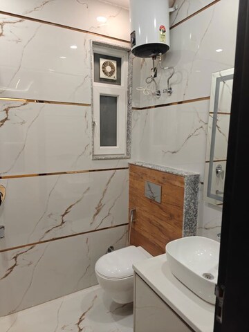 Bathroom in 4 BHK Builder Floor at Ansal Sushant Lok I, Sector 43 – for Rent