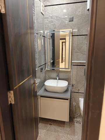 Bathroom in 4 BHK Builder Floor at Ansal Sushant Lok I, Sector 43 – for Rent