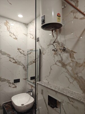 Bathroom in 4 BHK Builder Floor at Ansal Sushant Lok I, Sector 43 – for Rent