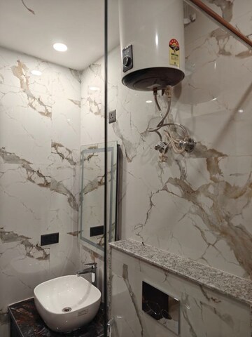 Bathroom in 4 BHK Builder Floor at Ansal Sushant Lok I, Sector 43 – for Rent