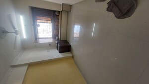 Room in 2 BHK Apartment at Charkop Kesar CHS, Kandivali West – for Sale