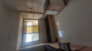 Kitchen in 2 BHK Apartment at Charkop Kesar CHS, Kandivali West – for Sale