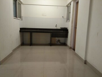 Kitchen in 2 BHK Apartment at Sun City – for Sale