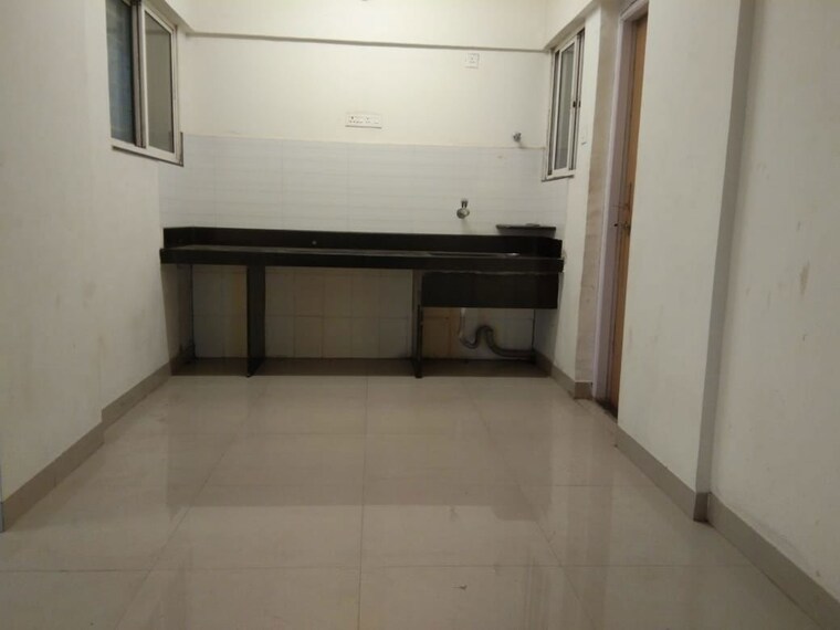 Kitchen, sun city 2 Bedroom 980 Sq.Ft. Apartment In Sun City Pune 10072826