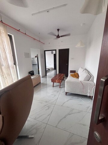 Living Room in 1 BHK Apartment at Raymond Ten X Vibes, J K Gram – for Rent