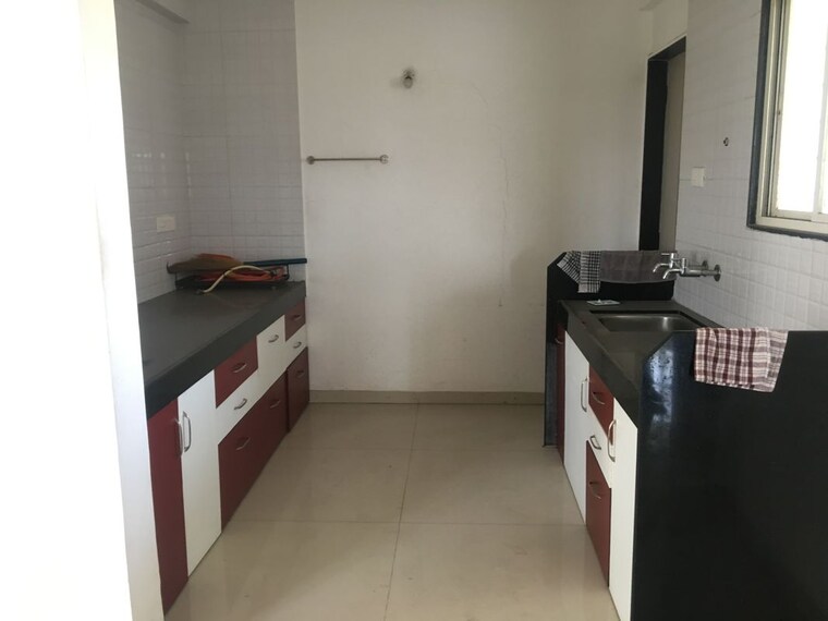 Kitchen, sun city 2 Bedroom 970 Sq.Ft. Apartment In Sun City Pune 10072839