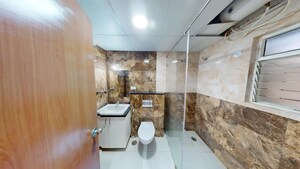 Bathroom in 4 BHK Apartment at Yeshwanthpur – for Sale