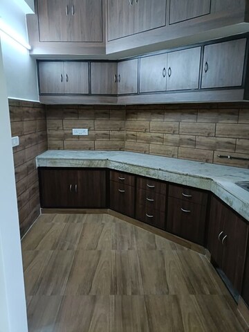 Kitchen in 3 BHK Apartment at Vasundhara Enclave – for Sale