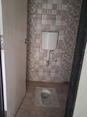 Bathroom in 2 BHK Apartment at Dhankawade Pokale Tamarind Park, Dhayari – for Rent