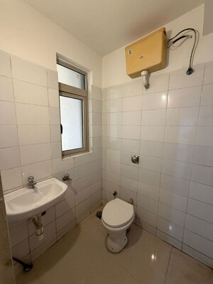 Bathroom in 2 BHK Apartment at Dosti West County Phase 4 Dosti Pine, Balkum Pada – for Rent