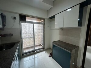 Kitchen in 2 BHK Apartment at Dosti West County Phase 4 Dosti Pine, Balkum Pada – for Rent