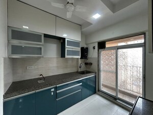 Kitchen in 2 BHK Apartment at Dosti West County Phase 4 Dosti Pine, Balkum Pada – for Rent
