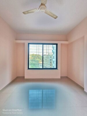 Bedroom in 2 BHK Apartment at Balaji Paradise, Dhayari – for Rent