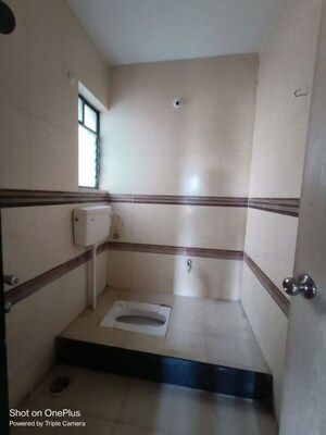 Bathroom in 2 BHK Apartment at Balaji Paradise, Dhayari – for Rent