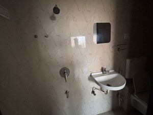 Bathroom in 2 BHK Apartment at Eternity Mall, Raghunath Nagar – for Rent