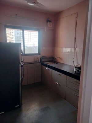 Kitchen in 2 BHK Apartment at Rajdeep CHS Naupada, Naupada – for Rent