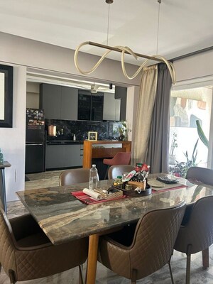 Living Room in 4 BHK Apartment at Samrat Gilt Residences, Uday Baug – for Sale