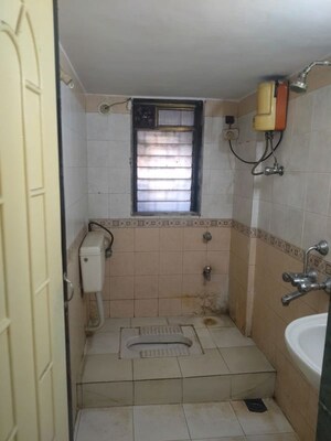 Bathroom in 2 BHK Apartment at Vardhman Gardens, Balkum Pada – for Rent