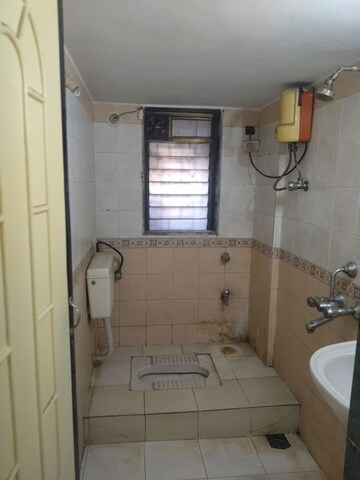 Bathroom in 2 BHK Apartment at Vardhman Gardens, Balkum Pada – for Rent