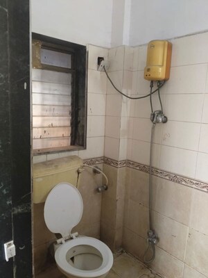 Bathroom in 2 BHK Apartment at Vardhman Gardens, Balkum Pada – for Rent