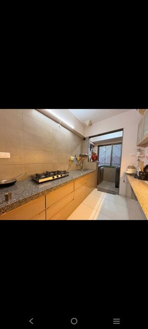 Kitchen in 3 BHK Apartment at Swati Chrysantha, Shela – for Rent