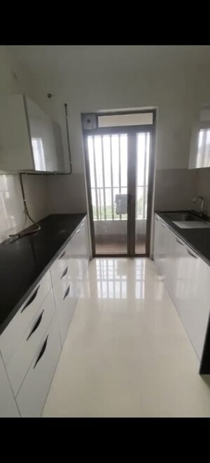 Kitchen in 2 BHK Apartment at Kalpataru Paramount, Kapur Bawdi – for Rent