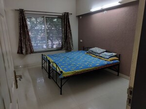 Bedroom in 2 BHK Apartment at Mirchandani Palms, Rahatani – for Rent