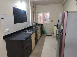 Kitchen in 2 BHK Apartment at Mirchandani Palms, Rahatani – for Rent