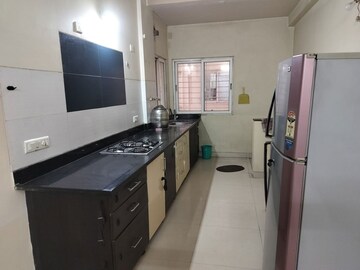 Kitchen in 2 BHK Apartment at Mirchandani Palms, Rahatani – for Rent