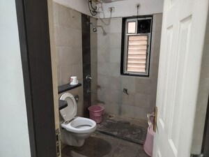 Bathroom in 2 BHK Apartment at Mirchandani Palms, Rahatani – for Rent