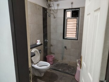 Bathroom in 2 BHK Apartment at Mirchandani Palms, Rahatani – for Rent